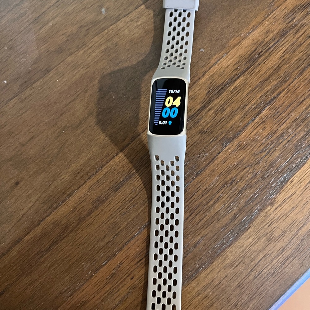 Fitbit Smartwatch with Cream Band